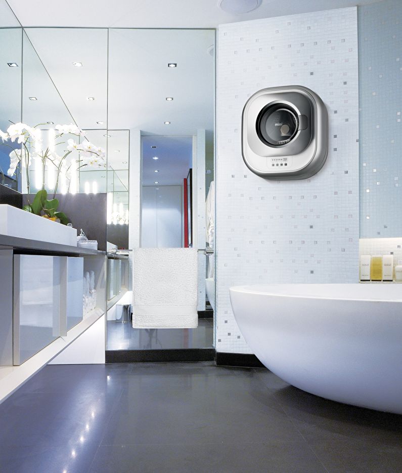 Hanging washing machine in the bathroom interior - photo