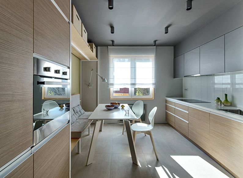 Beige kitchen in the style of minimalism - photo