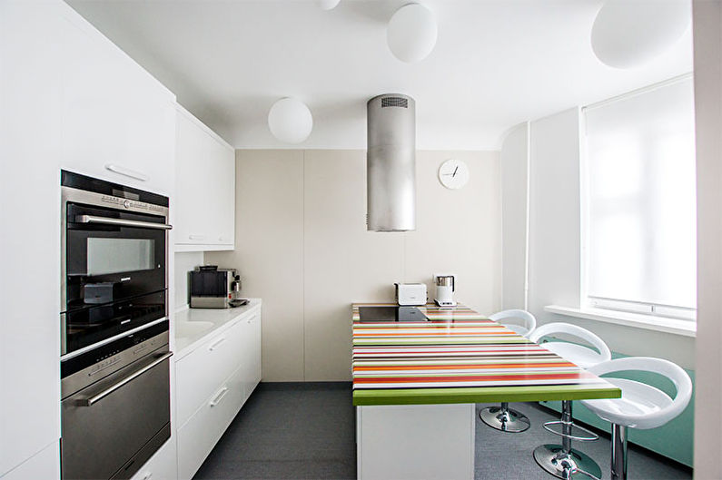 Design of a spacious kitchen in the style of minimalism - photo