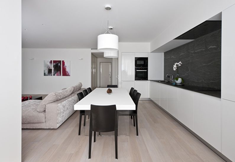 The design of the kitchen-living room in the style of minimalism - photo