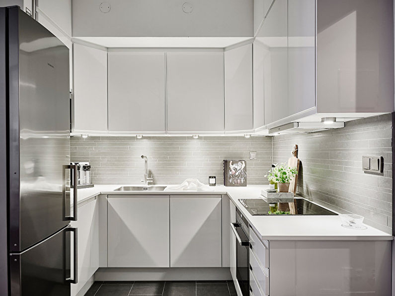 Minimalism corner kitchen design - photo
