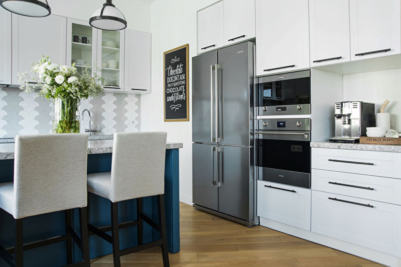 Kitchen interior design with island - photo