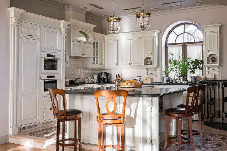 Kitchen interior design with island - photo