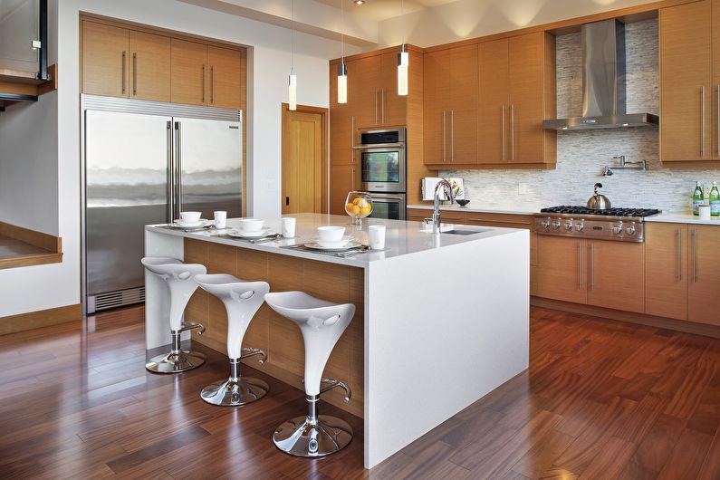 Kitchen interior design with island - photo