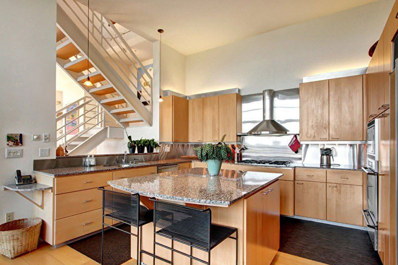 Kitchen interior design with island - photo