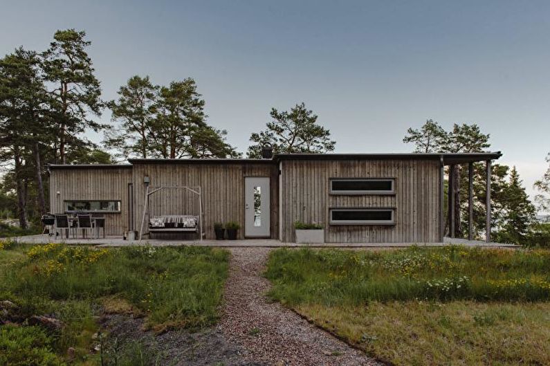 Ang harapan ng isang bahay ng bansa sa estilo ng Scandinavian - larawan