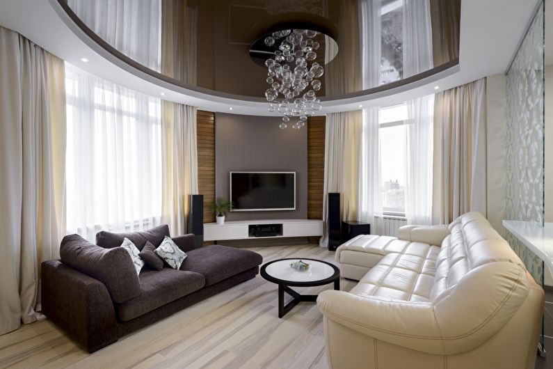Brown glossy stretch ceiling in the hall (living room) - photo