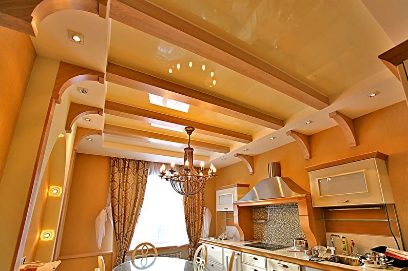 Glossy stretch ceiling in the kitchen - photo