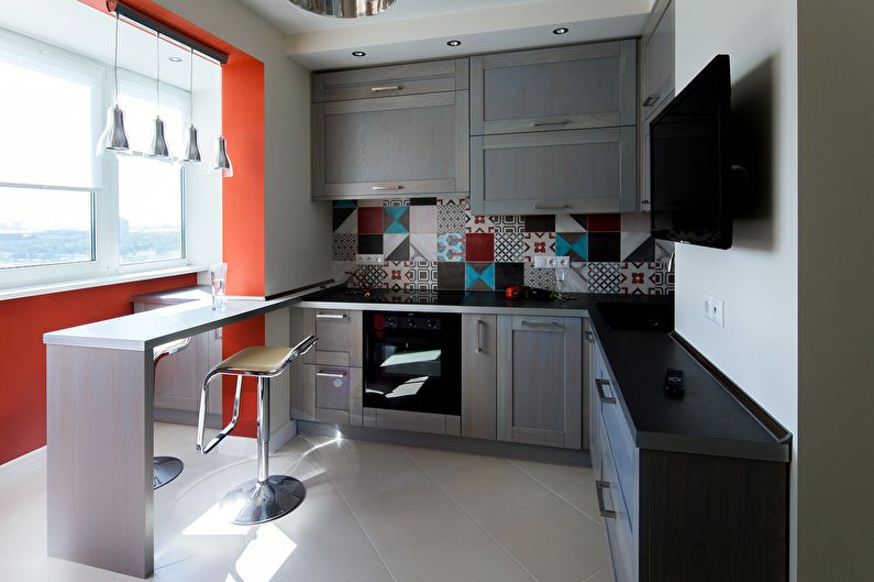 Kitchen design 9 sq.m. with a balcony