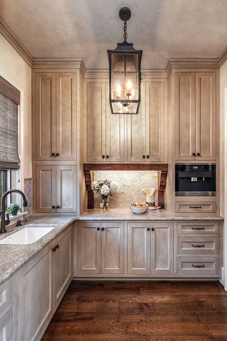 Interior of a small kitchen in Italian style - photo