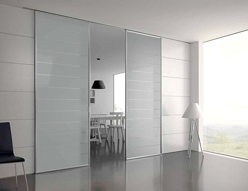 Sliding glass partitions in the apartment