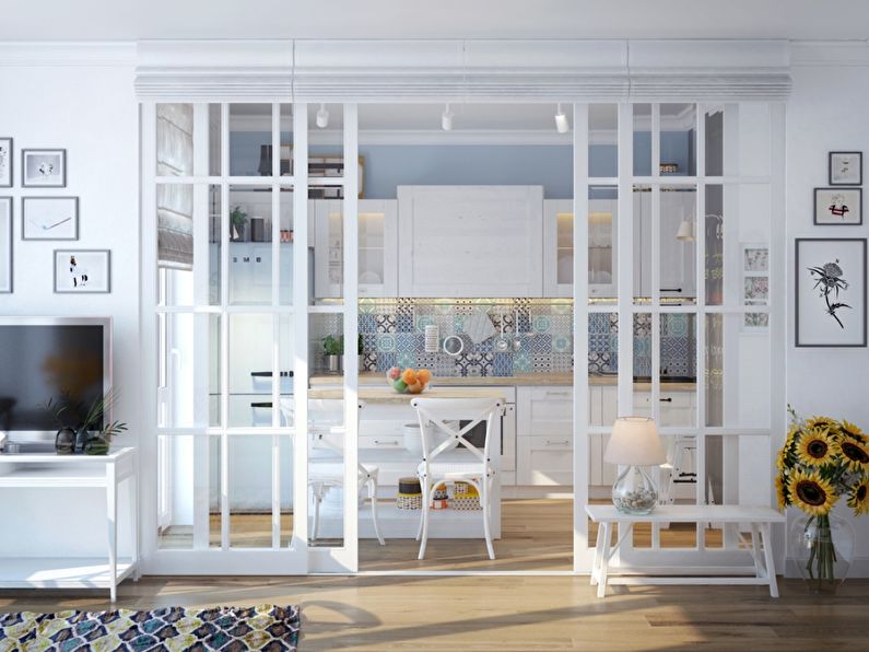 Glass partitions in the interior of the kitchen / dining room