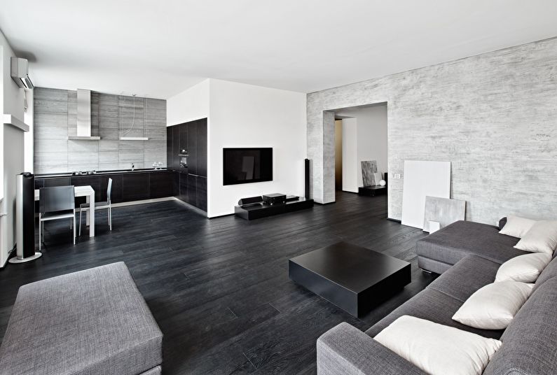 The combination of colors in the interior of the living room - black with white