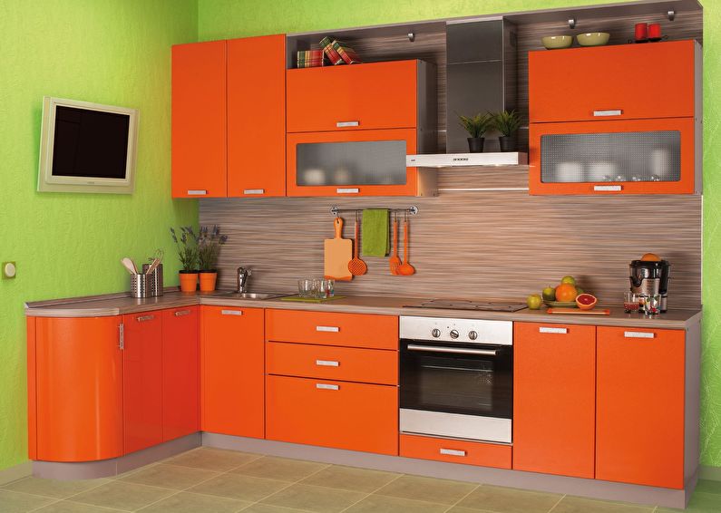 The combination of colors in the interior of the kitchen - orange with green