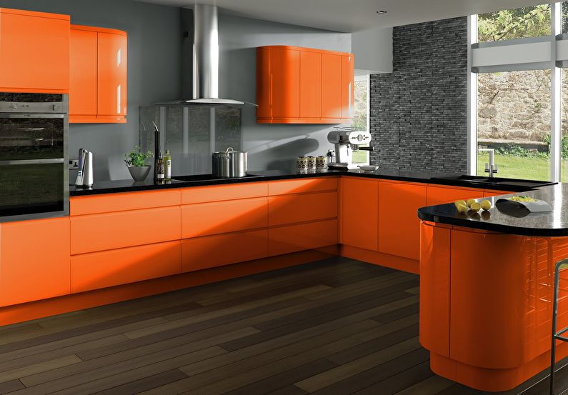 The combination of colors in the interior of the kitchen - orange with gray