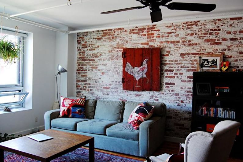 Brick wall in the living room interior - photo