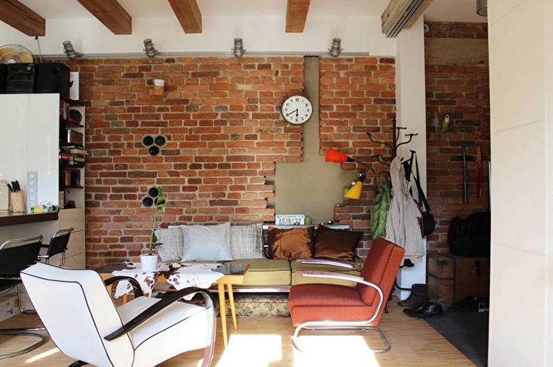 Brick wall in the living room interior - photo