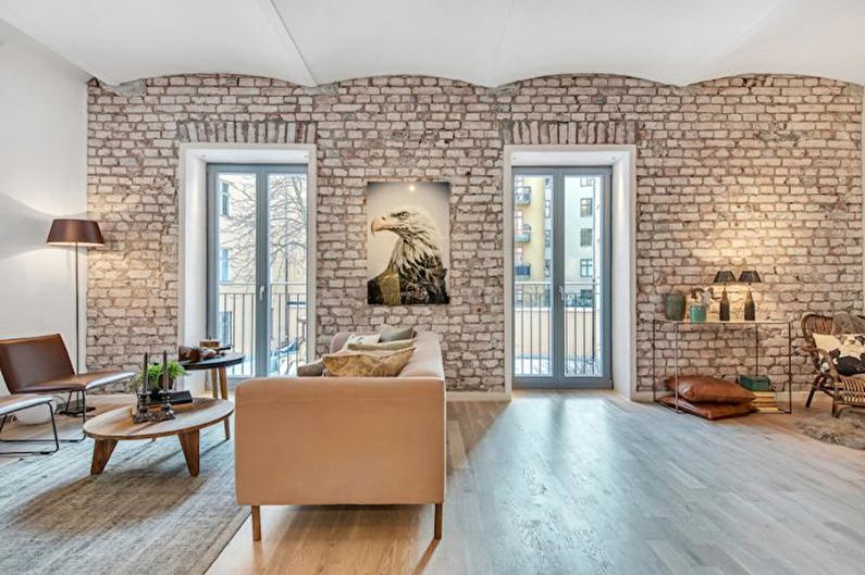 Brick wall in the living room interior - photo