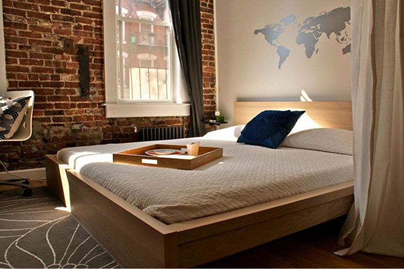Brick wall in bedroom interior - photo