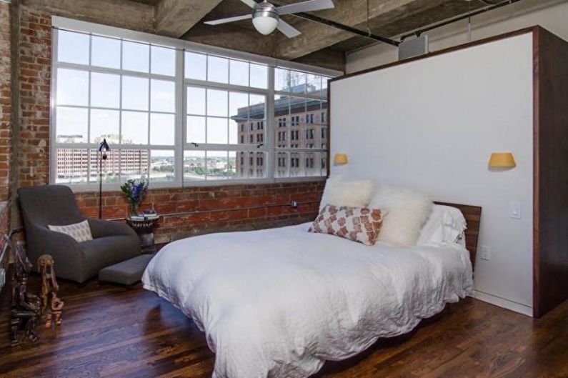 Brick wall in bedroom interior - photo
