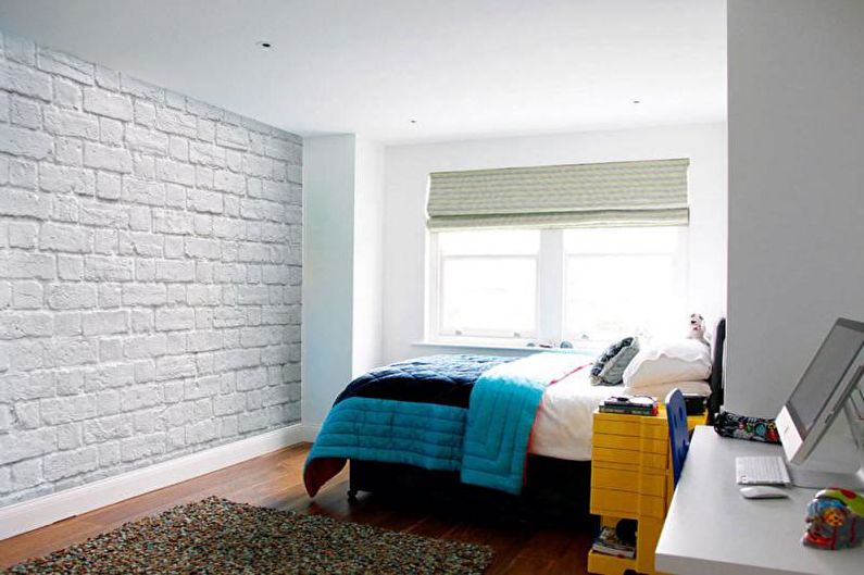 Brick wall in the interior of a children's room - photo
