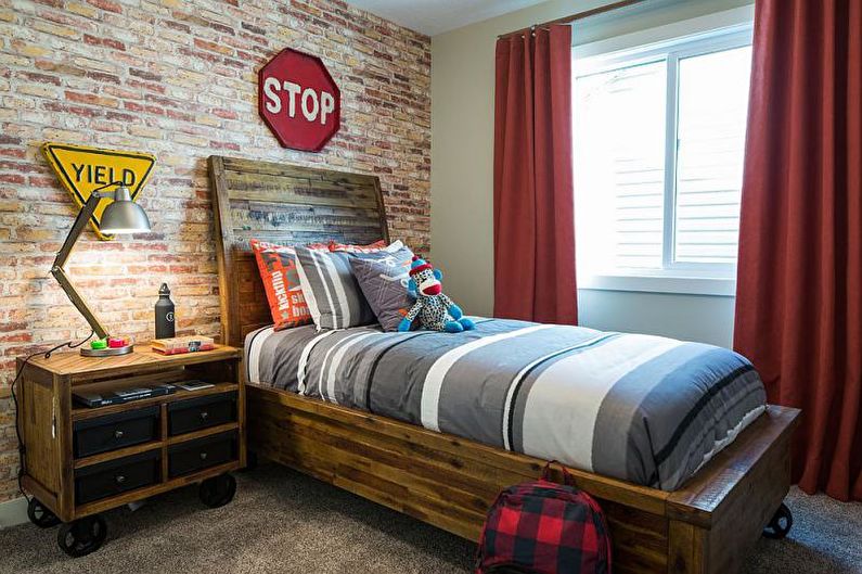 Brick wall in the interior of a children's room - photo