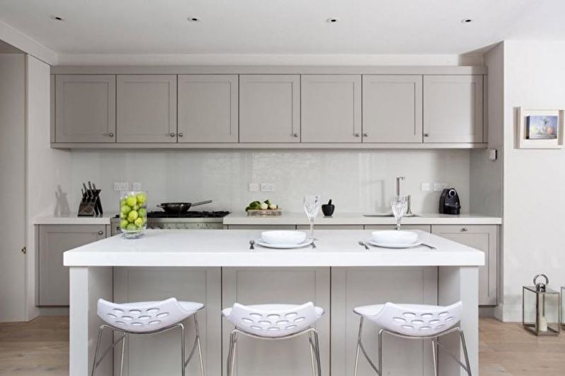 Kitchen interior design in gray - photo