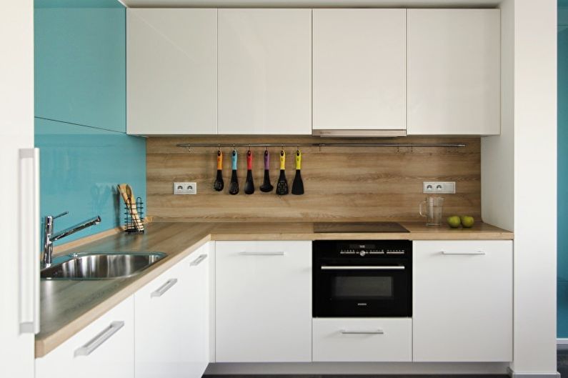 Interior design of a kitchen in turquoise tones - photo