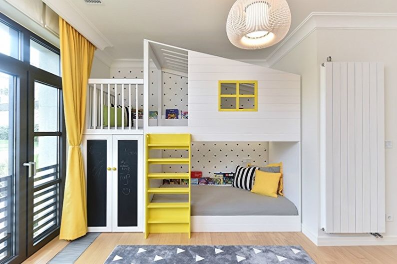 Interior design of a children's room for a boy and a girl - photo