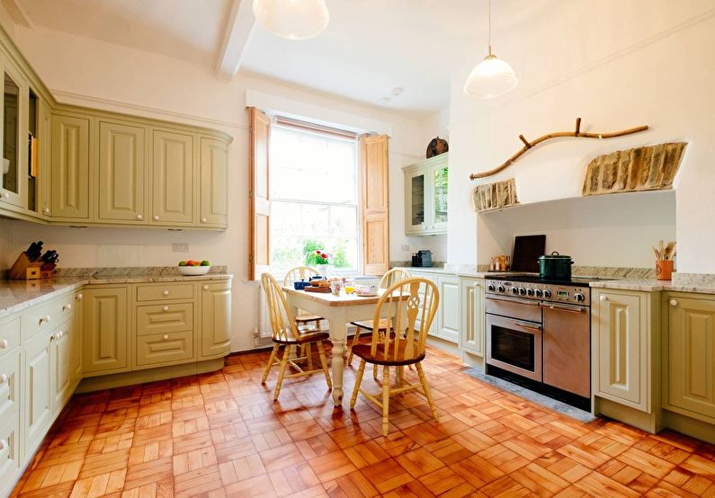 Interior design of kitchen in country style - photo