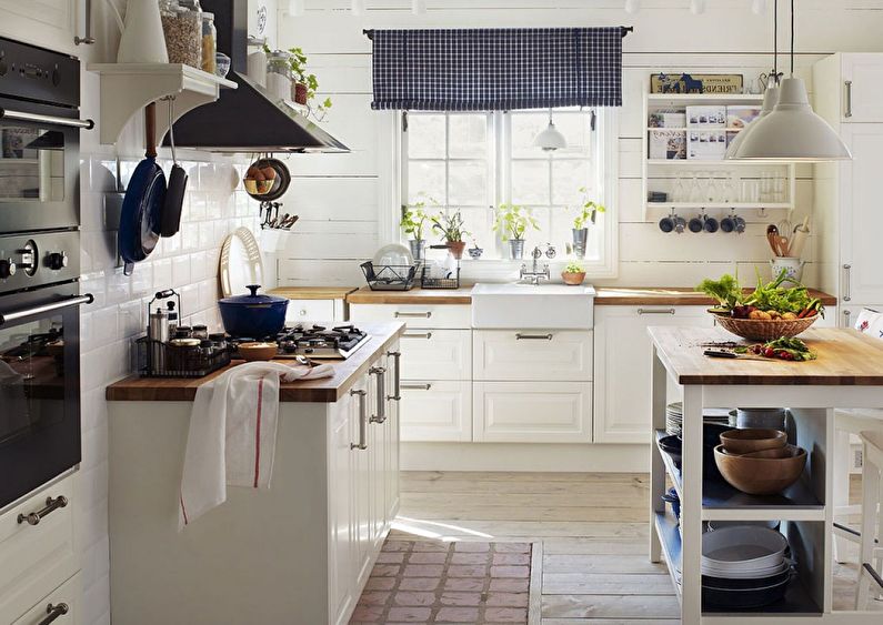 Interior design of kitchen in country style - photo