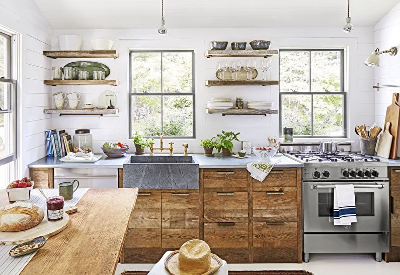 Interior design of kitchen in country style - photo