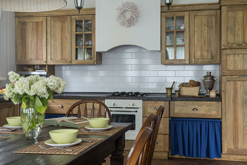 Interior design of kitchen in country style - photo