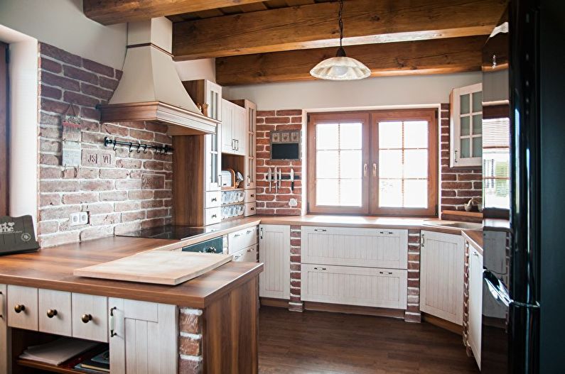 Interior design of kitchen in country style - photo