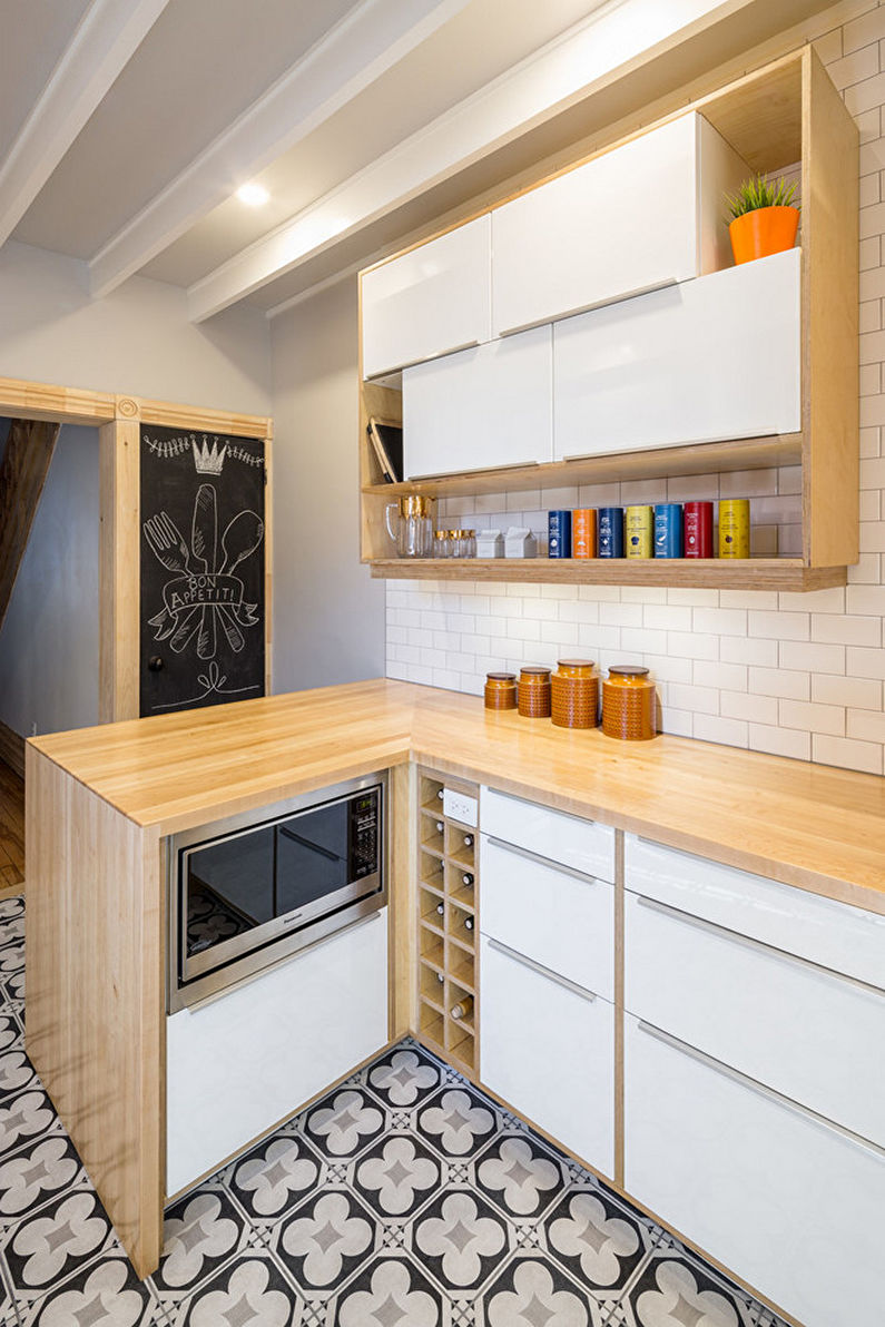 Tiles for the kitchen on the floor - photo