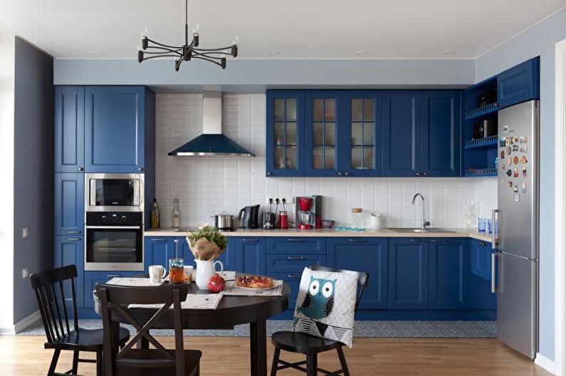 Kitchen interior design in blue tones - photo