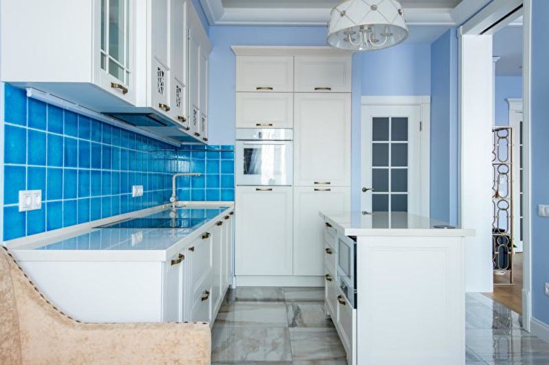 Kitchen interior design in blue tones - photo