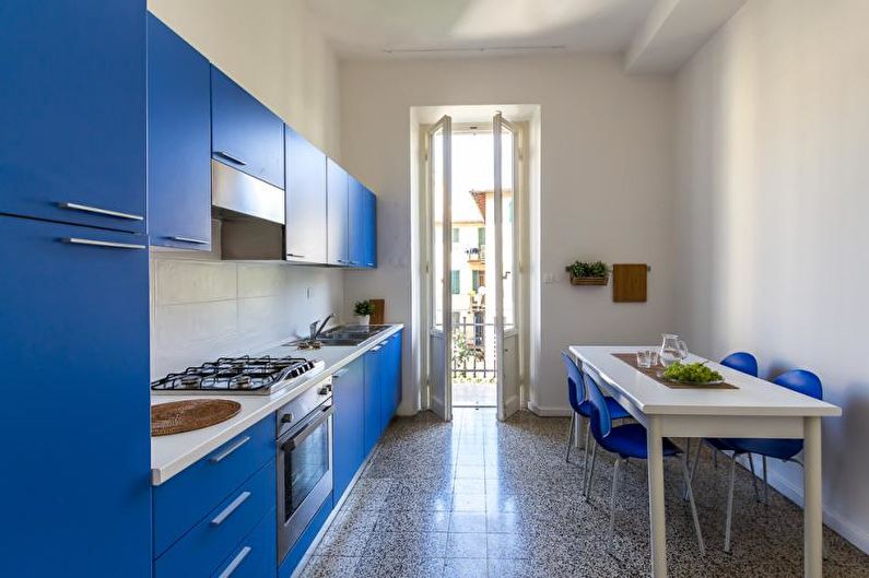 Kitchen interior design in blue tones - photo
