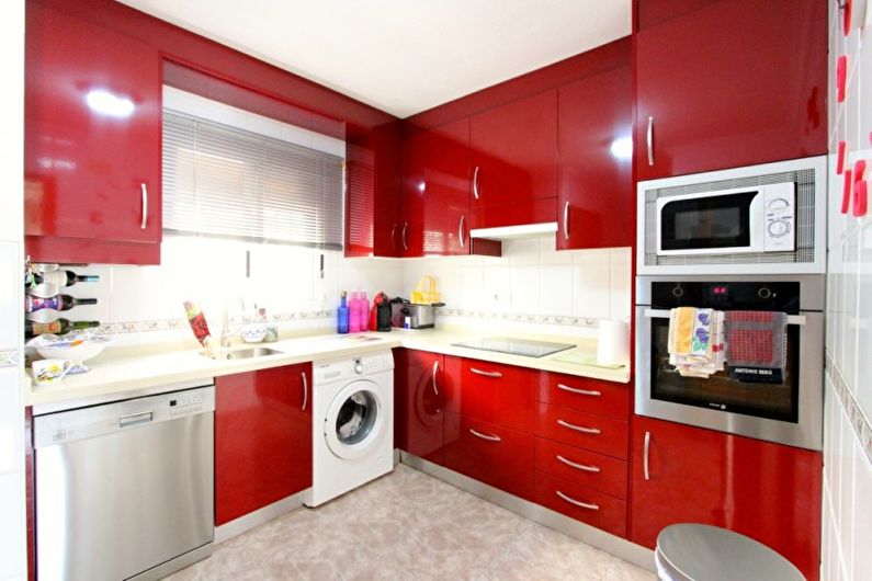 Kitchen interior design in red - photo
