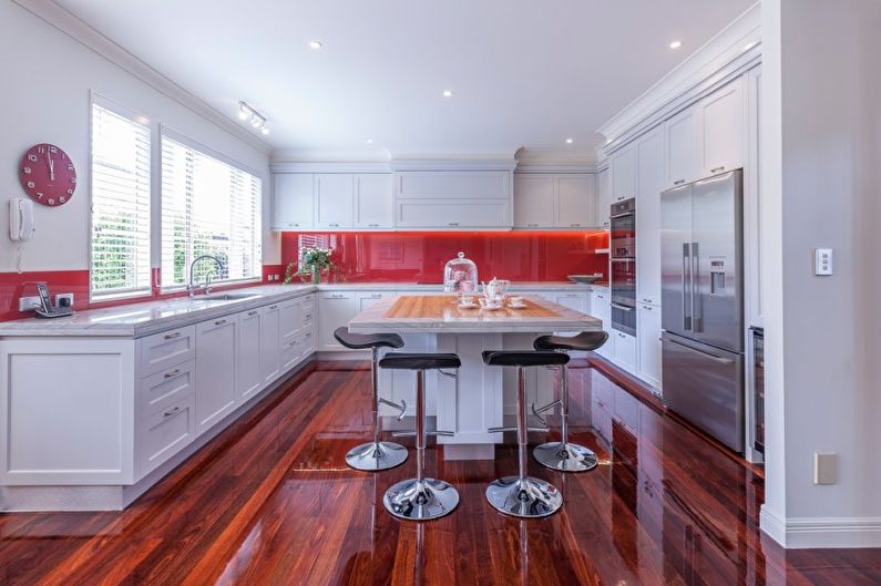 Kitchen interior design in red - photo