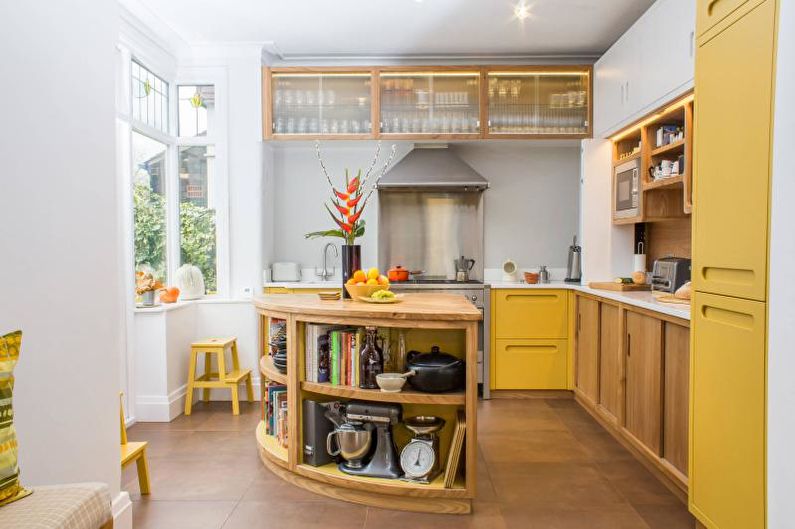 Kitchen interior design in yellow - photo