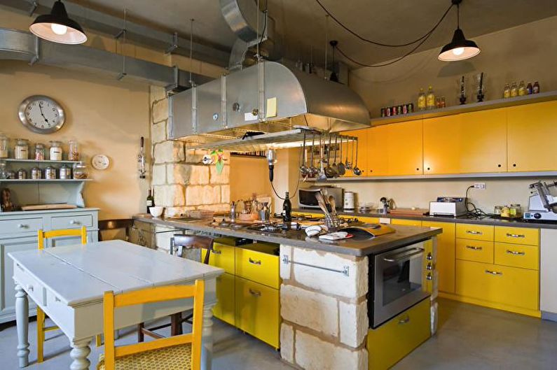 Kitchen interior design in yellow - photo