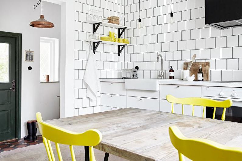 Kitchen interior design in yellow - photo