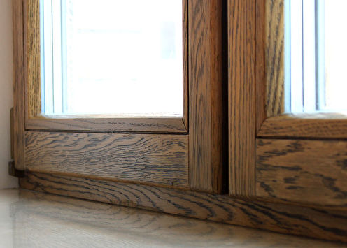 Why are wooden double-glazed windows better than plastic?