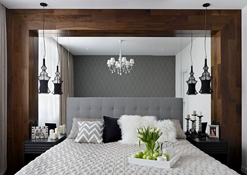Interior design bedroom in Khrushchev - Large mirror at the head of the bed