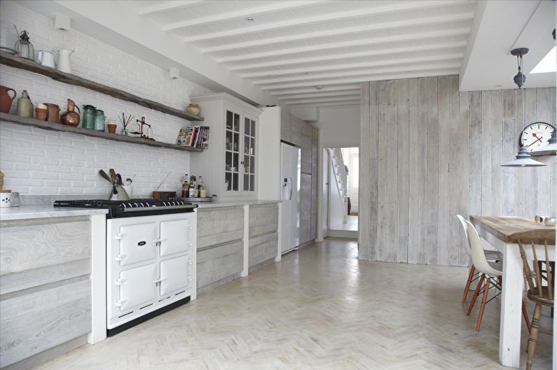 Laminate on the wall in the interior of the kitchen - photo