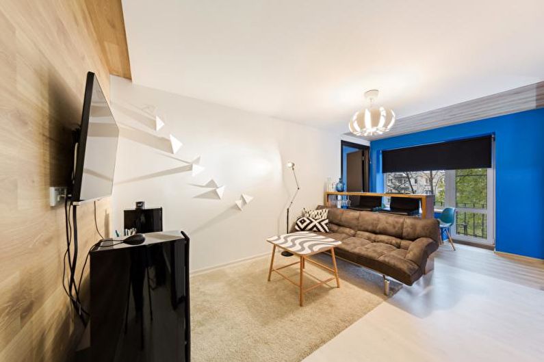 Laminate on the wall in the living room interior - photo