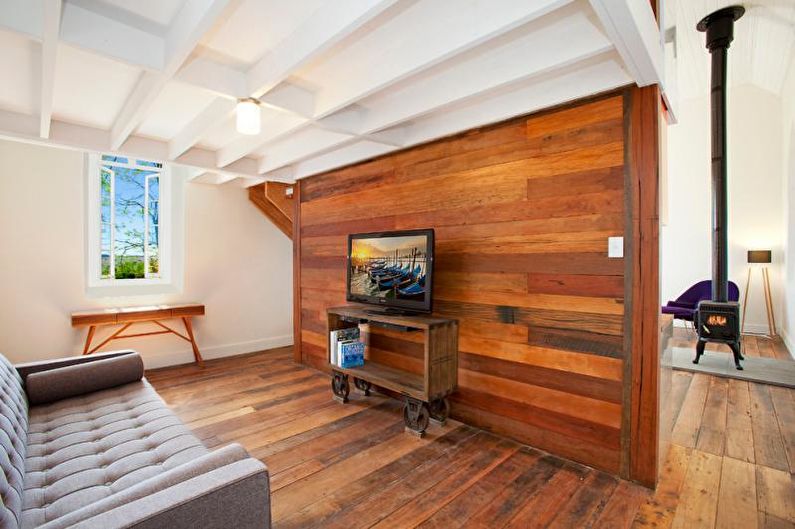 Laminate on the wall in the living room interior - photo