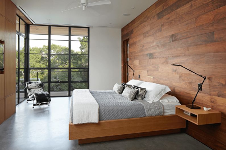 Laminate on the wall in the bedroom interior - photo