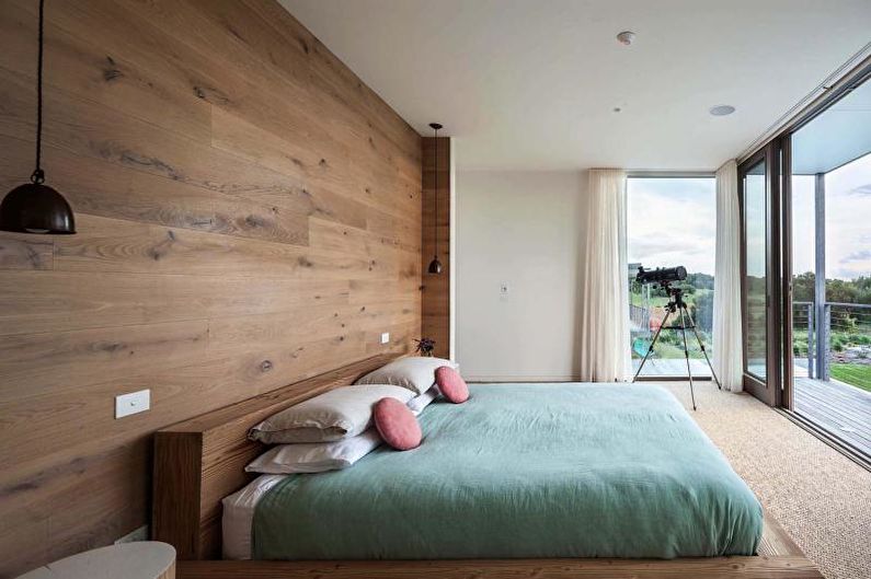 Laminate on the wall in the bedroom interior - photo